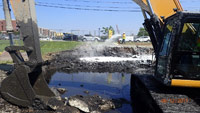 June 2017 - Spraying foam to suppress odors around ISS site west of River Road