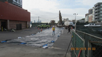 October 2019 - Moving Excavator from South of Pier Building to Bulkhead Tent