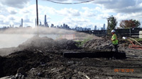 September 2019 - Applying Piian Odor Suppressant During Outside Soil Mixing South of Pier Building